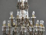 an image of a chandelier made of glass and metal