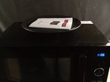 a microwave that is sitting on top of a counter