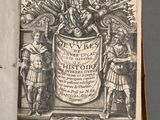 an open book with a drawing of a man on a horse