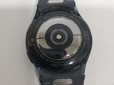a close up of a smart watch on a white surface