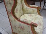 a chair that is sitting on the floor in the room