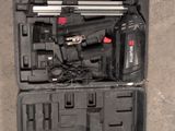 a black case with tools inside of it on the floor