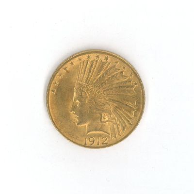 une pièce d'or sur laquelle est représentée une tête d'Indien