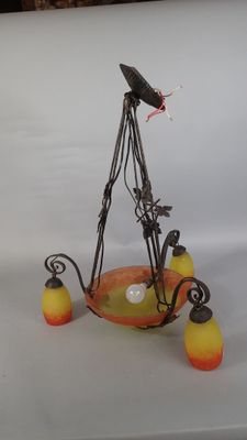 a bird that is sitting on top of a table