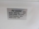 an image of a white refrigerator with a label on it