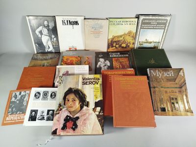 a lot of books that are on the table