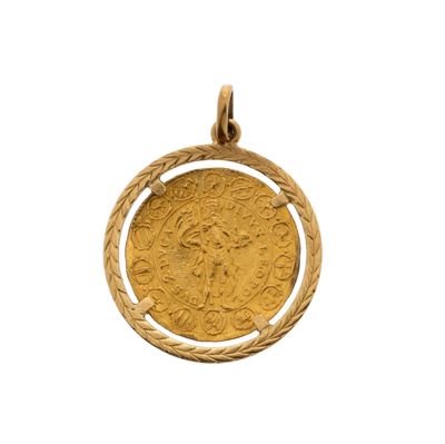 une pièce d'or à l'effigie d'une femme