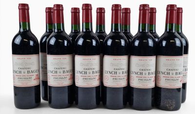 six bottles of red wine are lined up in a row