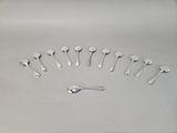 a lot of spoons and spoon spoons on the table