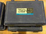 a blue case that has four keys in it