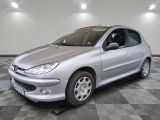 a picture of a silver car parked in a garage