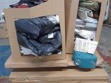 two cardboard boxes stacked on top of each other on the floor