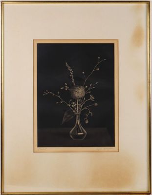 a picture of a picture of a vase with flowers in it