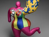 a close up of a figurine of a person holding a cup