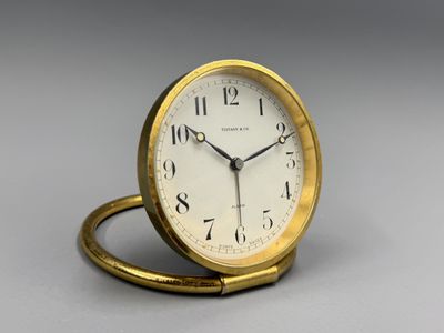 a small clock that is sitting on a table