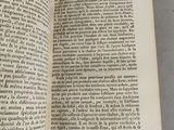 an open book that is sitting on a table