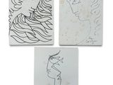 trois dessins représentant le visage d'une femme et celui d'un homme sur du papier blanc