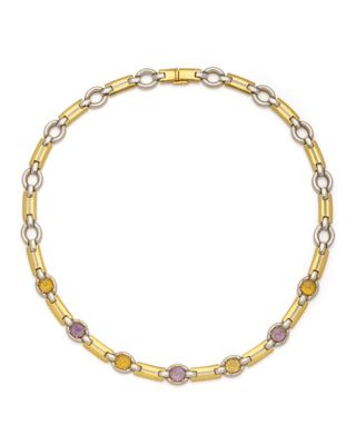 un bracelet en or et en argent orné de pierres multicolores