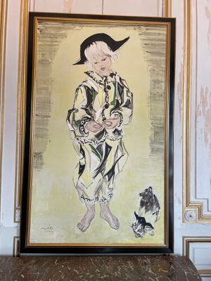 a picture of a painting of a man with a dog on a table