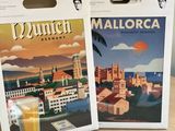 two boxes of malorca beer on a table next to each other