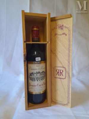 a bottle of wine in a wooden box on a white background