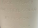 a close up of a white vase with writing on it