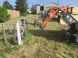 a small machine that is sitting in the grass