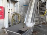an image of a conveyor belt in a factory