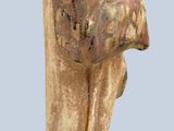 a statue of a woman holding a bird in her hand
