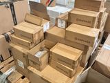 a pile of boxes sitting on a pallet in a warehouse