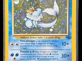 a close up of a pokemon card on a black background