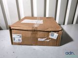 a cardboard box sitting on a table with a price tag on it