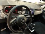 the interior of a car with a steering wheel and dashboard lights