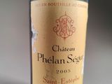 a bottle of wine that is sitting on a table