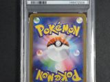 a close up of a pokemon card on a table
