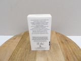 the box is empty on a wooden table with a white background