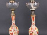 paire de vases chinois anciens ornés de motifs dorés et rouges