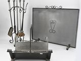 a fireplace screen with a bunch of tools on it
