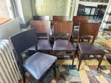 a lot of chairs that are sitting in a room