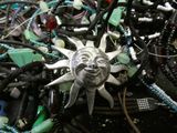 a picture of a pile of necklaces with a smiling face on them