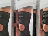 three boxes of donjoy knee braces on a table