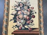 a picture of a picture of a vase of flowers on a table