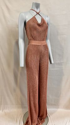 a mannequin wearing a pink jumpsuit with a halt