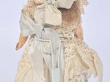 a doll that is sitting on top of a table