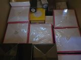 a box with many items in it sitting on the floor
