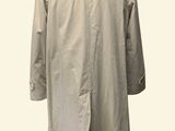 the back of a beige coat on a mannequin mannequin mannequin mannequin mannequin mannequin mannequin mannequin