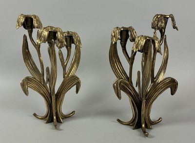pair of antique brass candlesticks with flowers and leaves