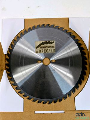 two circular saw blades in a box on a table