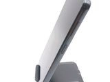 a close up of a cell phone on a stand