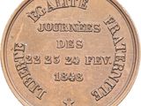 an image of a coin with the name of a man on it